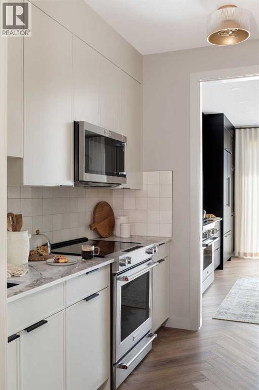 147 Siltstone Place, Balzac, AB - Indoor Photo Showing Kitchen