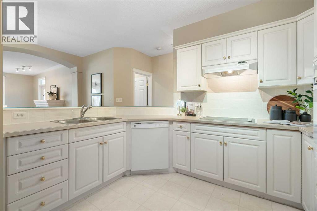 404, 2422 Erlton Street Sw, Calgary, AB - Indoor Photo Showing Kitchen With Double Sink