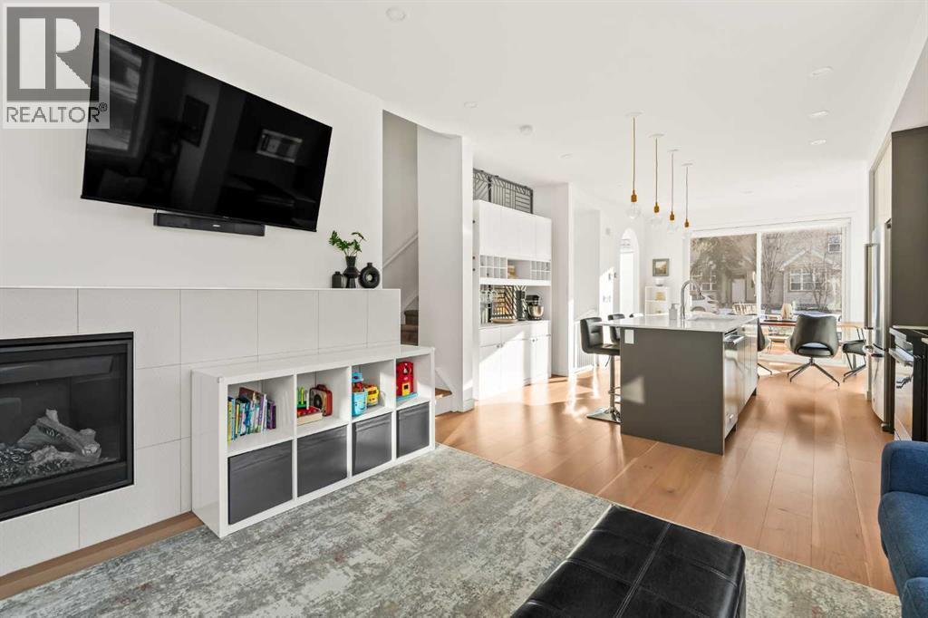 1940 Bowness Road Nw, Calgary, AB - Indoor Photo Showing Living Room With Fireplace
