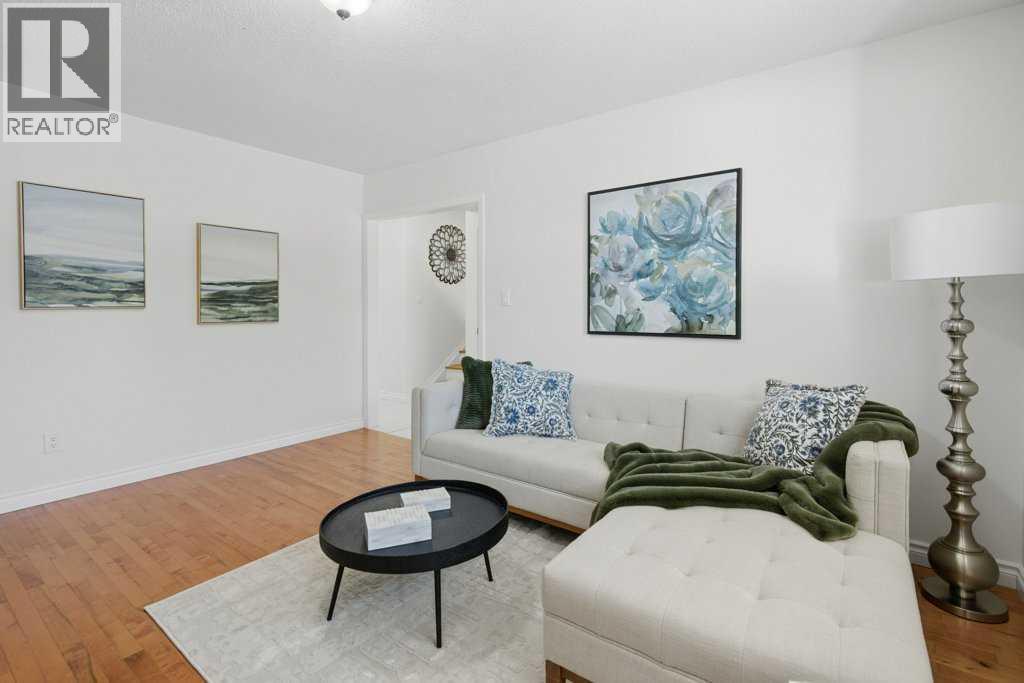 3703 Valdes Place Nw, Calgary, AB - Indoor Photo Showing Living Room