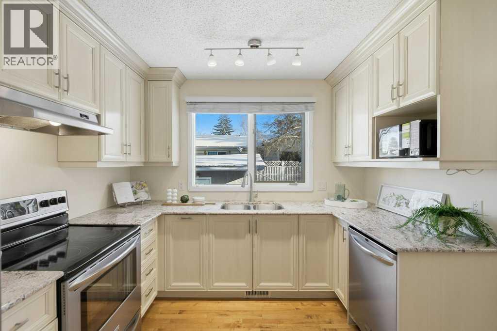 3703 Valdes Place Nw, Calgary, AB - Indoor Photo Showing Kitchen With Stainless Steel Kitchen