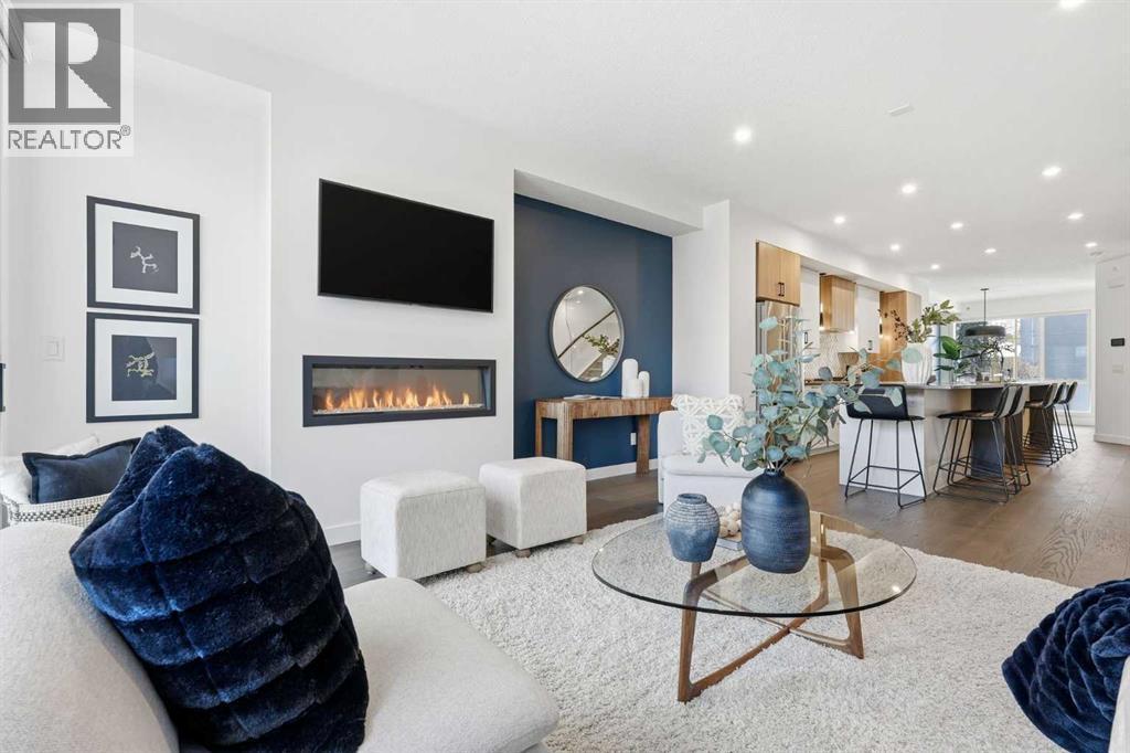 2104 17A Street Sw, Calgary, AB - Indoor Photo Showing Living Room With Fireplace