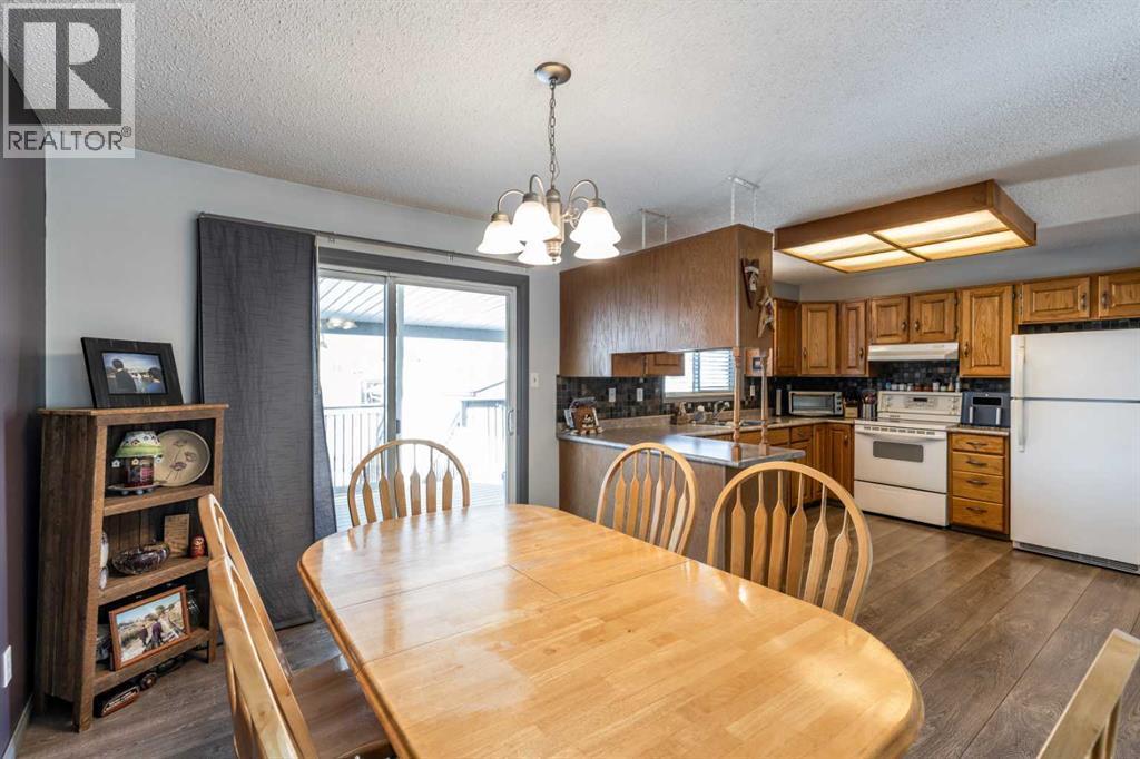52 Ross Haven Way Se, Medicine Hat, AB - Indoor Photo Showing Dining Room