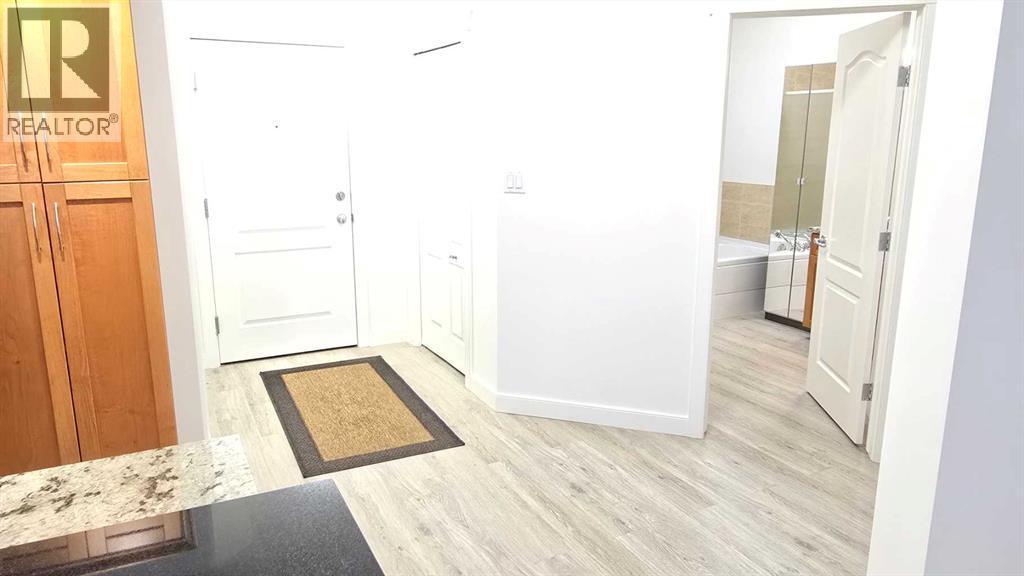 201, 10 Discovery Ridge Close Sw, Calgary, AB - Indoor Photo Showing Other Room