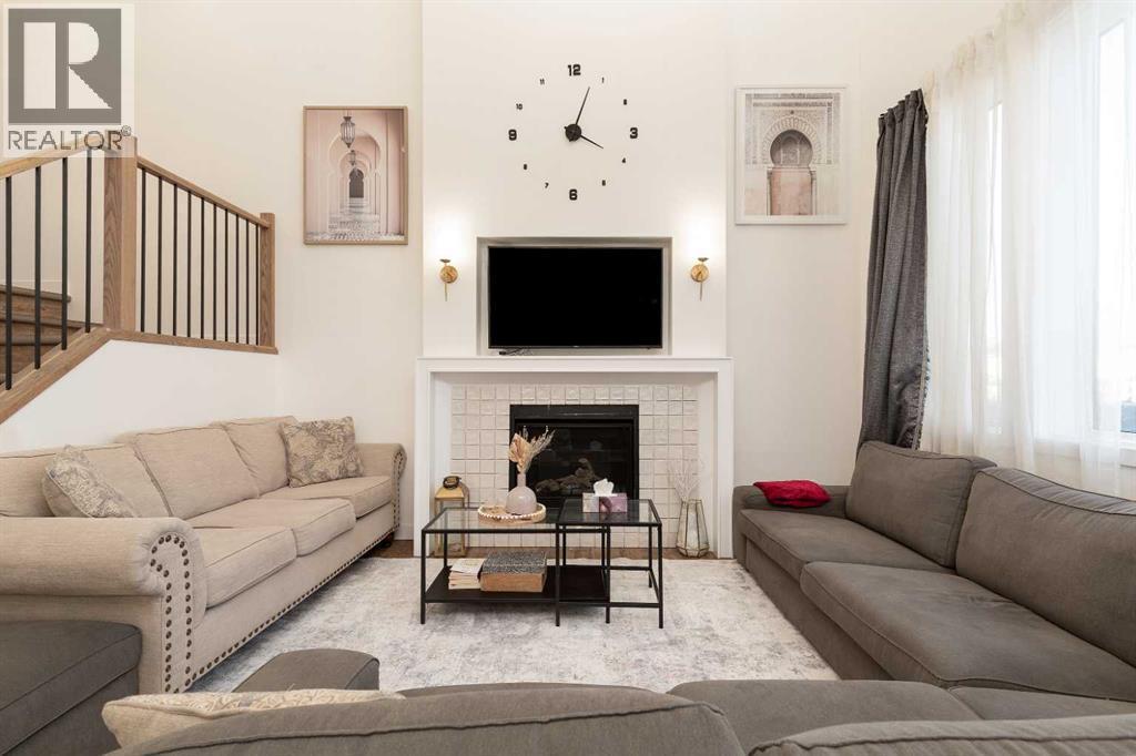 344 Rivergrove Chase W, Lethbridge, AB - Indoor Photo Showing Living Room With Fireplace