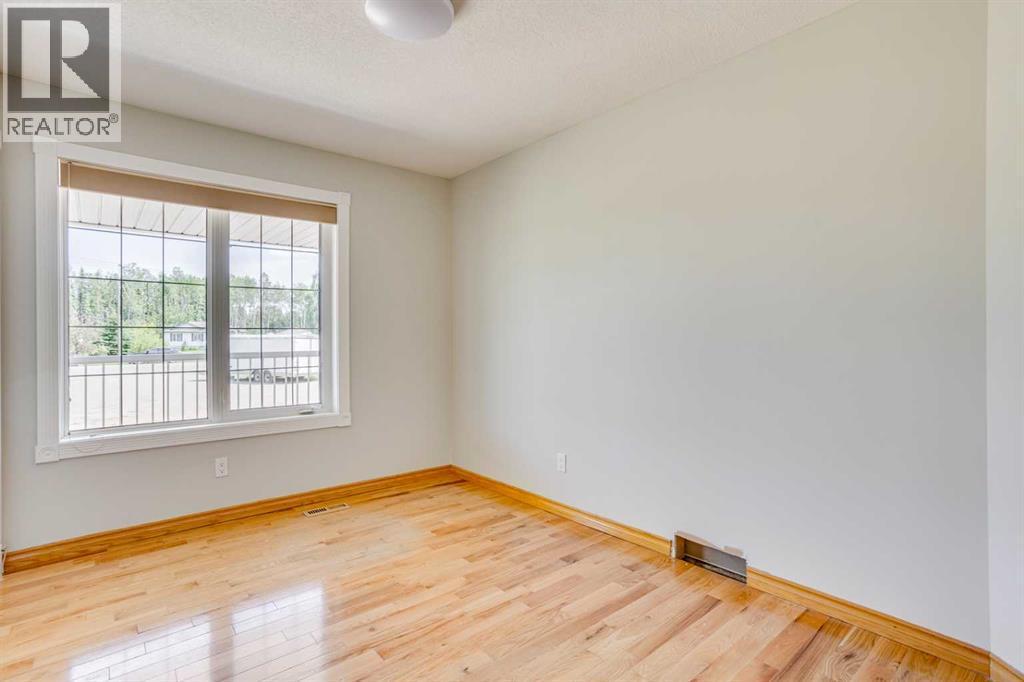 117 Cheecham Court, Anzac, AB - Indoor Photo Showing Other Room