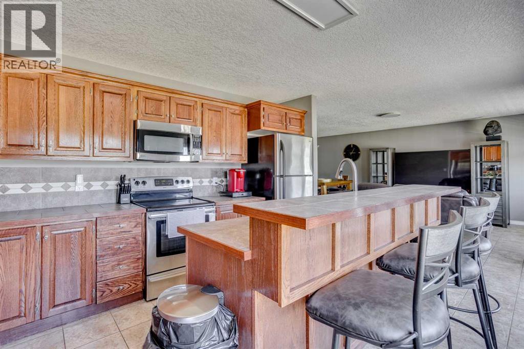 117 Cheecham Court, Anzac, AB - Indoor Photo Showing Kitchen