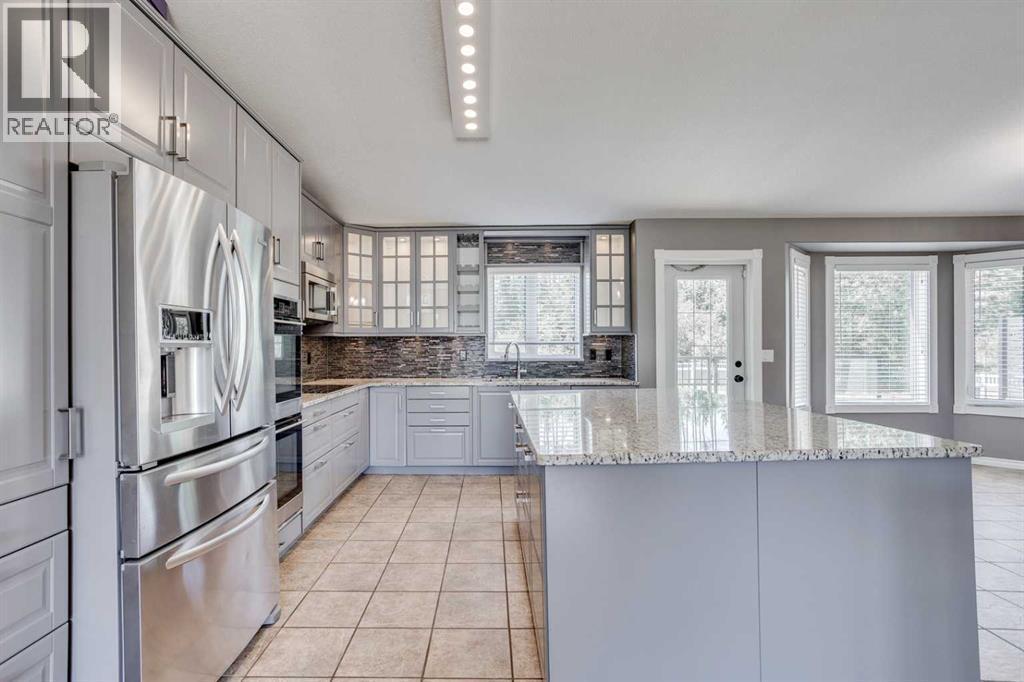 117 Cheecham Court, Anzac, AB - Indoor Photo Showing Kitchen With Upgraded Kitchen