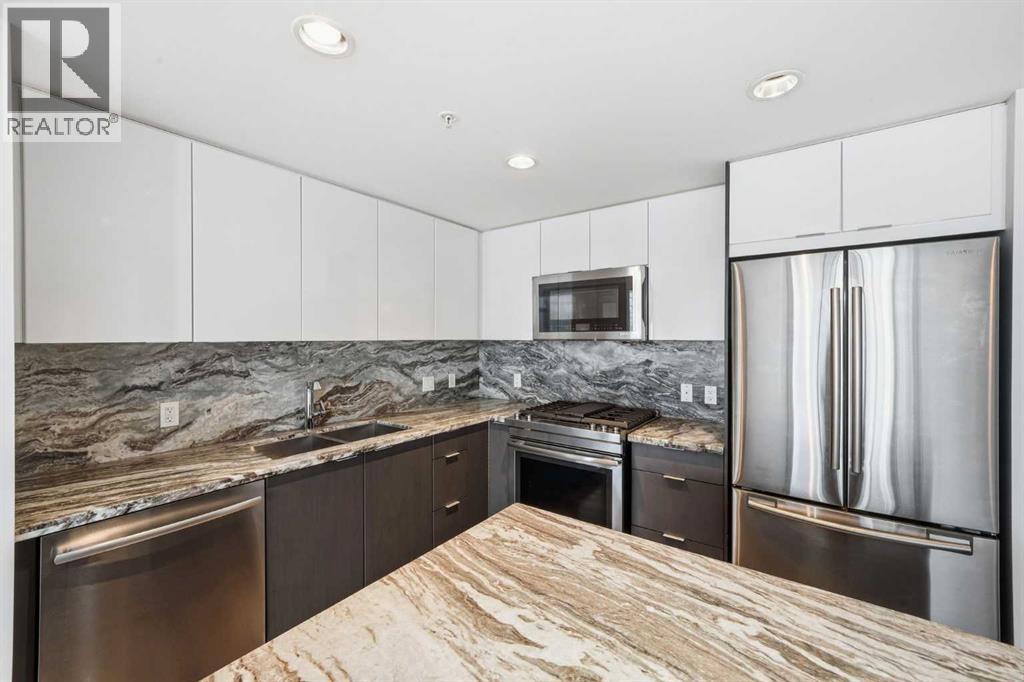 1604, 510 6 Avenue Se, Calgary, AB - Indoor Photo Showing Kitchen With Stainless Steel Kitchen With Double Sink With Upgraded Kitchen