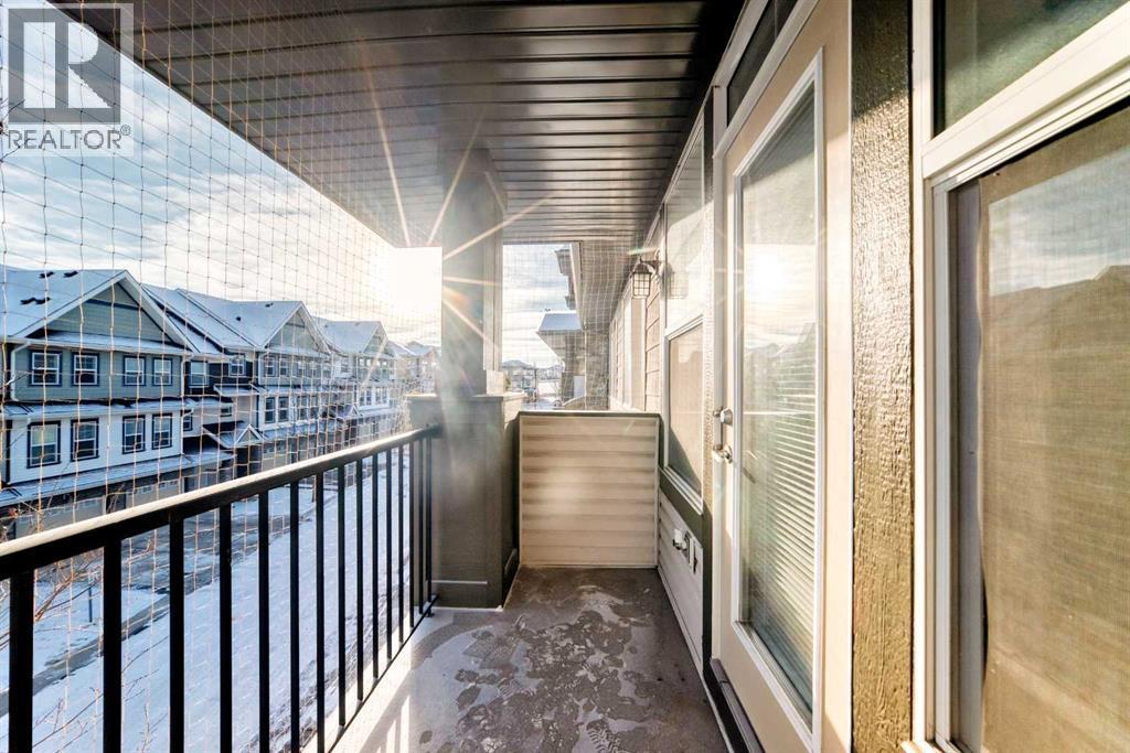 312, 48 Panatella Road Nw, Calgary, AB - Outdoor With Exterior