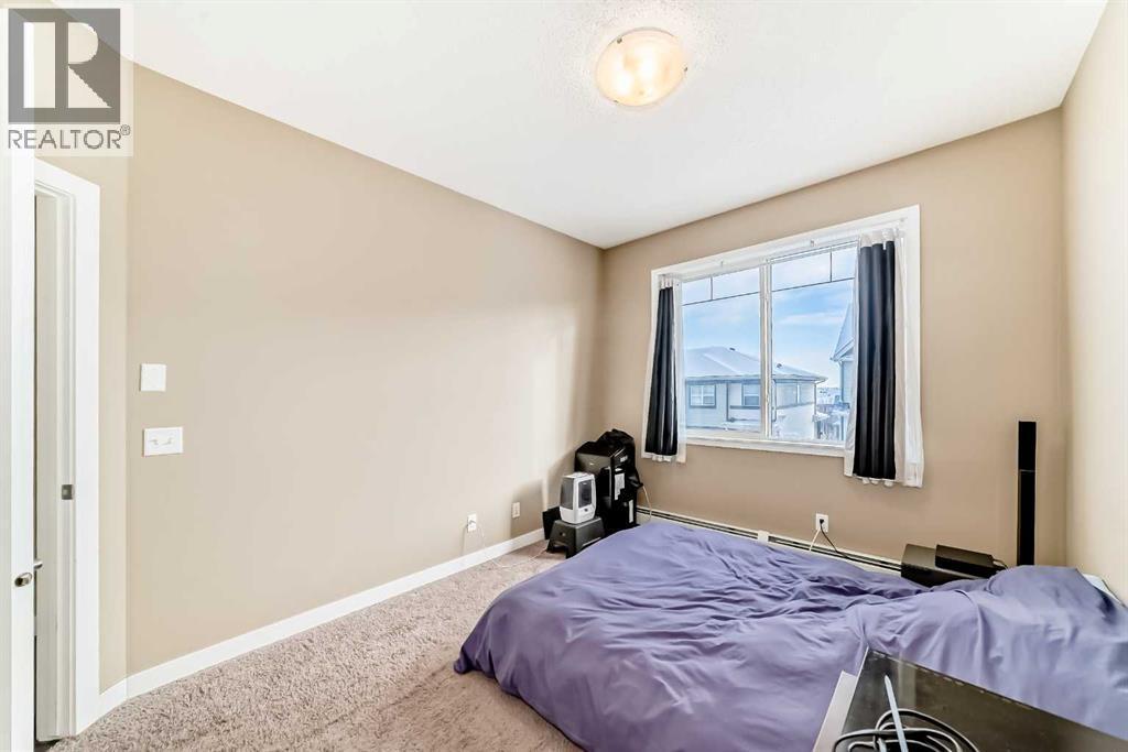 312, 48 Panatella Road Nw, Calgary, AB - Indoor Photo Showing Bedroom