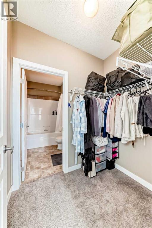 312, 48 Panatella Road Nw, Calgary, AB - Indoor With Storage