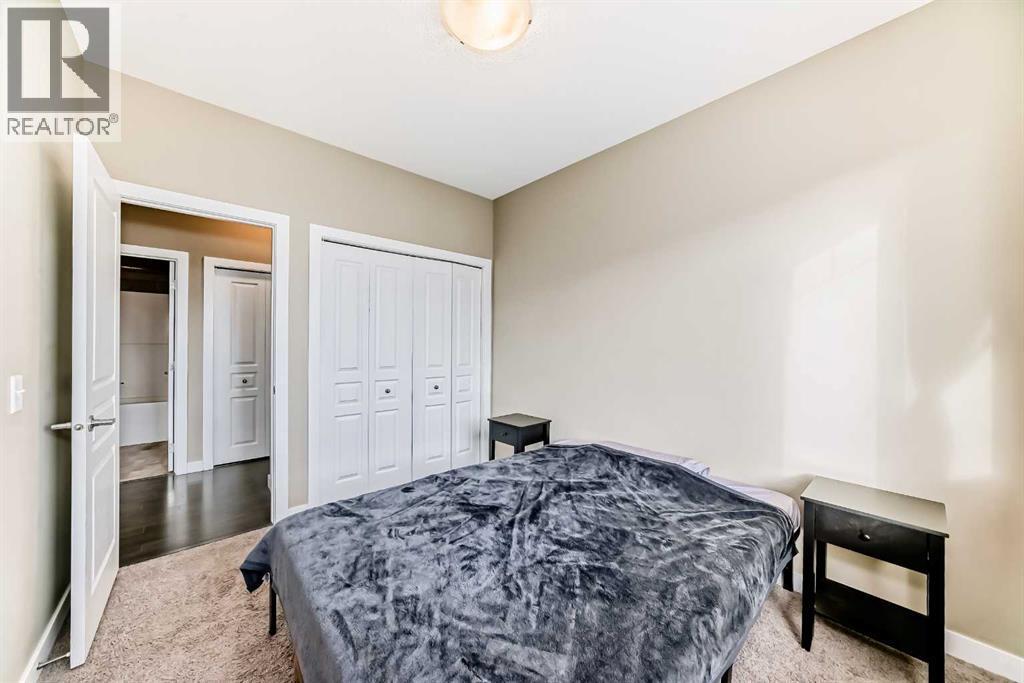 312, 48 Panatella Road Nw, Calgary, AB - Indoor Photo Showing Bedroom