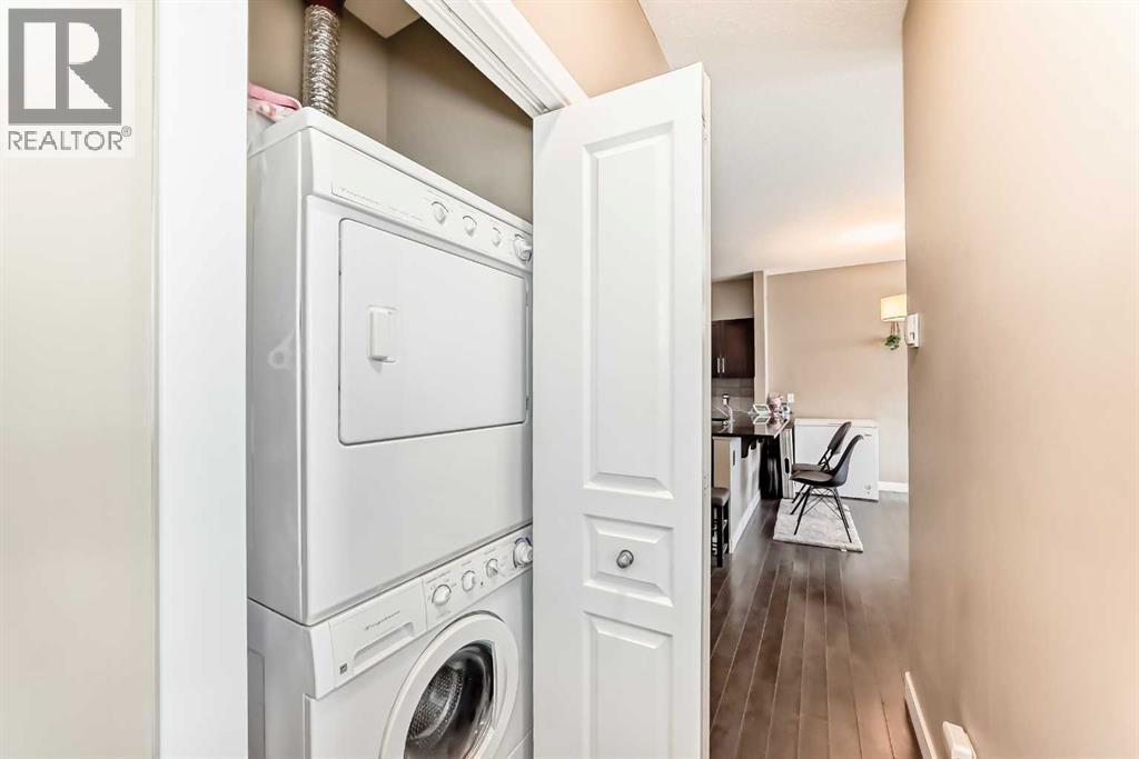 312, 48 Panatella Road Nw, Calgary, AB - Indoor Photo Showing Laundry Room