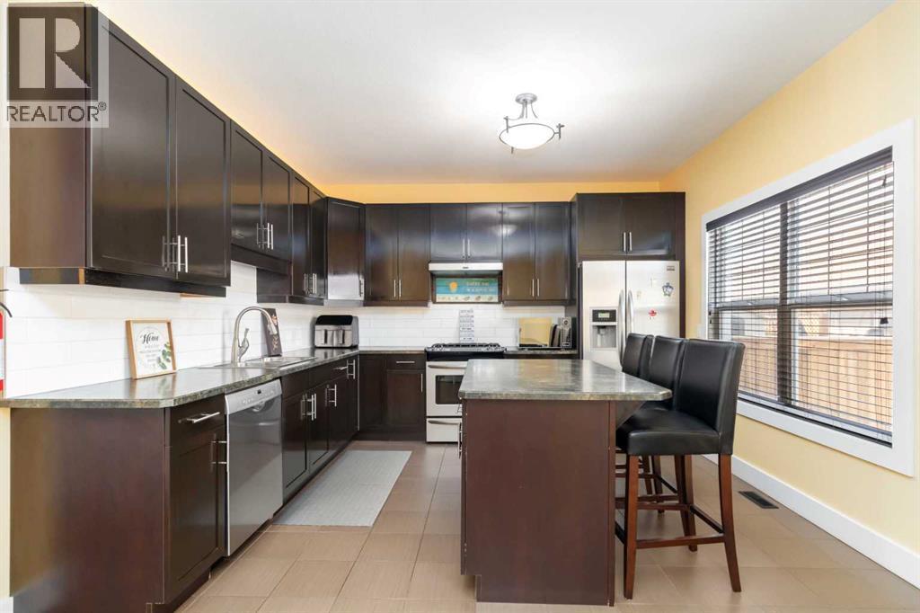 110 Merganser Crescent, Fort Mcmurray, AB - Indoor Photo Showing Kitchen With Stainless Steel Kitchen With Upgraded Kitchen