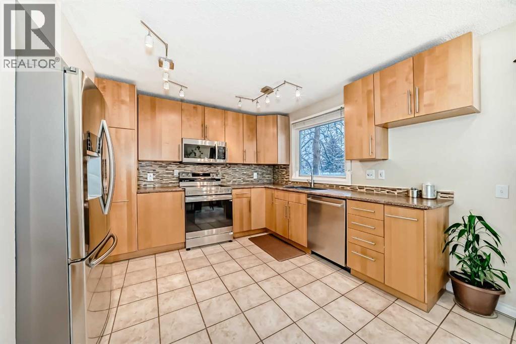 562 Strathcona Drive Sw, Calgary, AB - Indoor Photo Showing Kitchen With Stainless Steel Kitchen