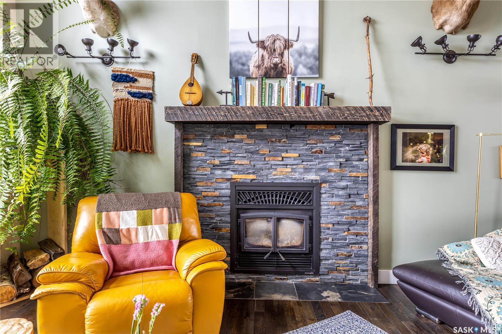 12 Vickar Place, Melfort, SK - Indoor Photo Showing Living Room With Fireplace