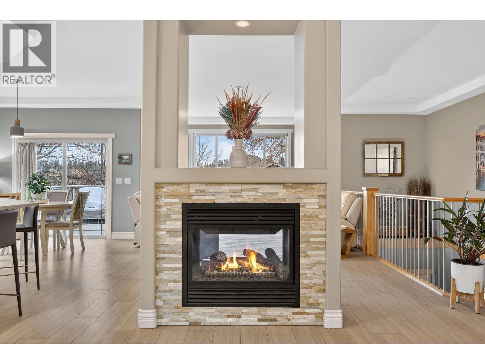 Main floor - 867 Steele Road, Kelowna, BC - Indoor Photo Showing Living Room With Fireplace