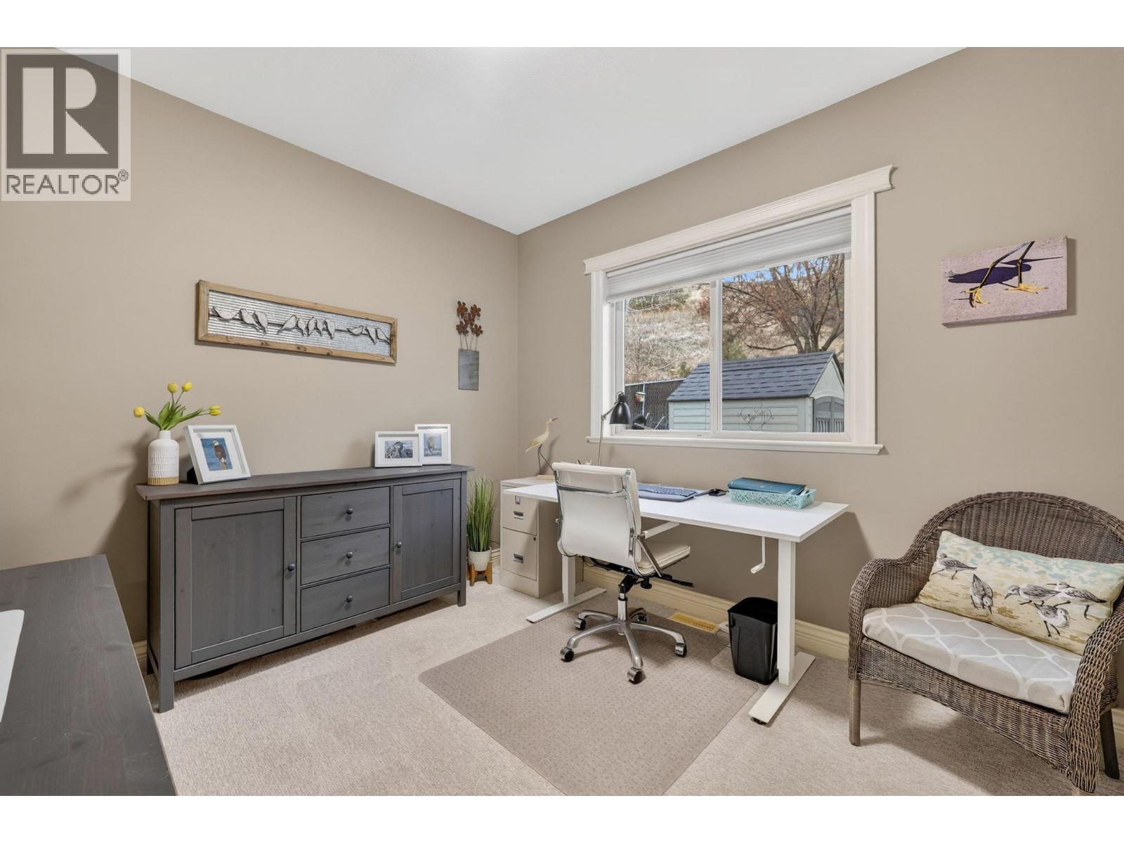 Third bedroom on the main floor, currently used as an office - 867 Steele Road, Kelowna, BC - Indoor Photo Showing Office