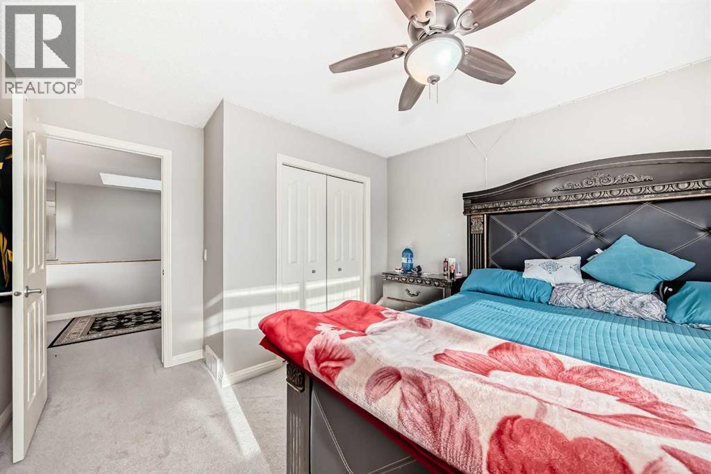 2468 Kingsland View Se, Airdrie, AB - Indoor Photo Showing Bedroom