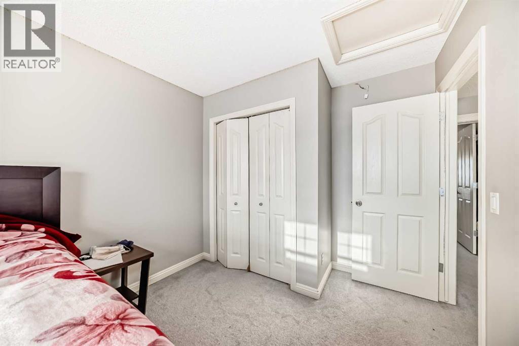 2468 Kingsland View Se, Airdrie, AB - Indoor Photo Showing Bedroom