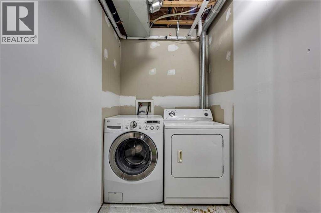 97 Piper Close, Blackfalds, AB - Indoor Photo Showing Laundry Room