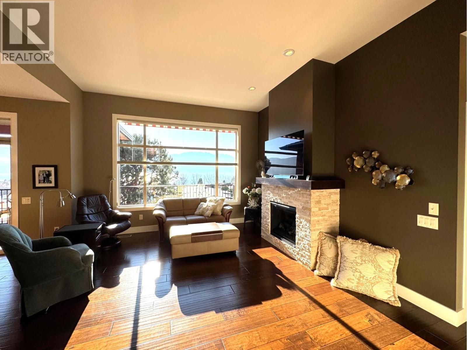 2167 Talavera Place, Westbank, BC - Indoor Photo Showing Living Room With Fireplace
