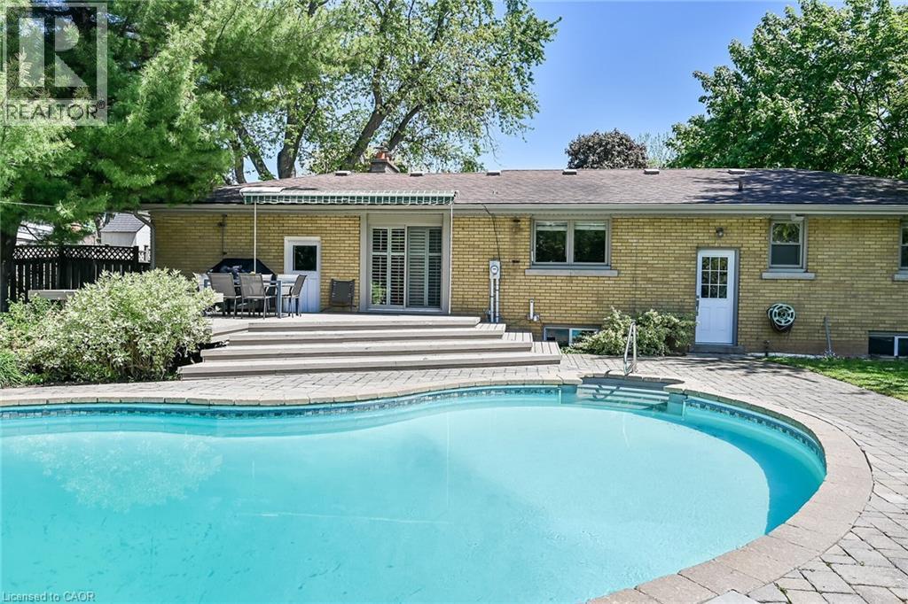 128 Oneida Boulevard, Ancaster, ON - Outdoor With In Ground Pool With Deck Patio Veranda