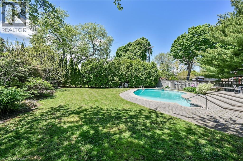 128 Oneida Boulevard, Ancaster, ON - Outdoor With In Ground Pool