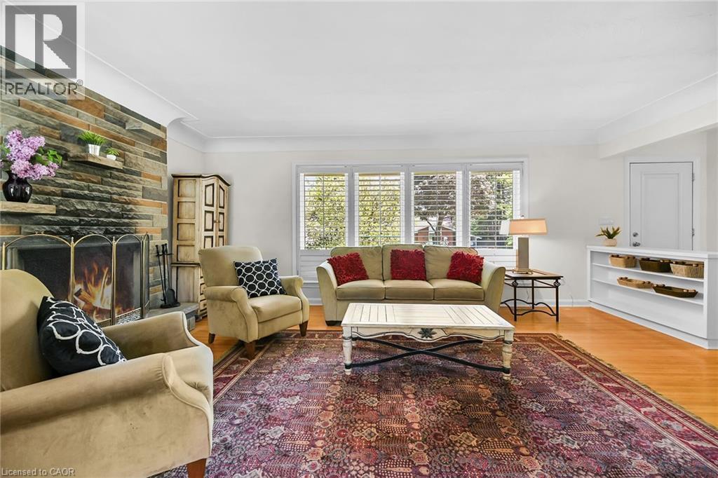 128 Oneida Boulevard, Ancaster, ON - Indoor Photo Showing Living Room With Fireplace