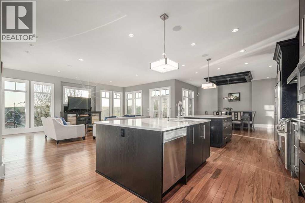 16 Spring Valley Way Sw, Calgary, AB - Indoor Photo Showing Kitchen With Upgraded Kitchen