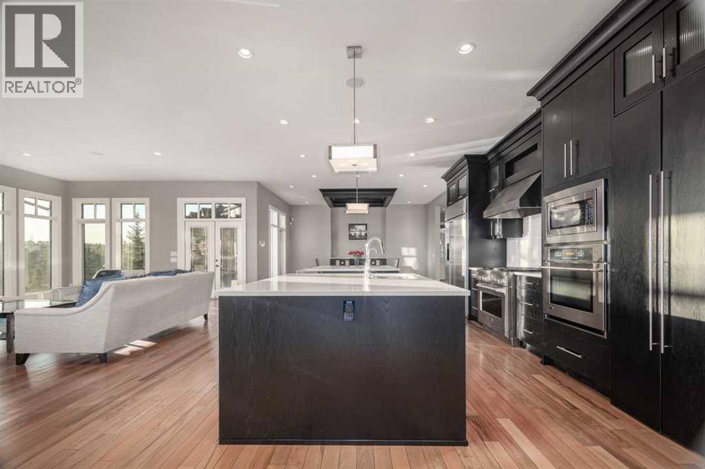 16 Spring Valley Way Sw, Calgary, AB - Indoor Photo Showing Kitchen With Upgraded Kitchen