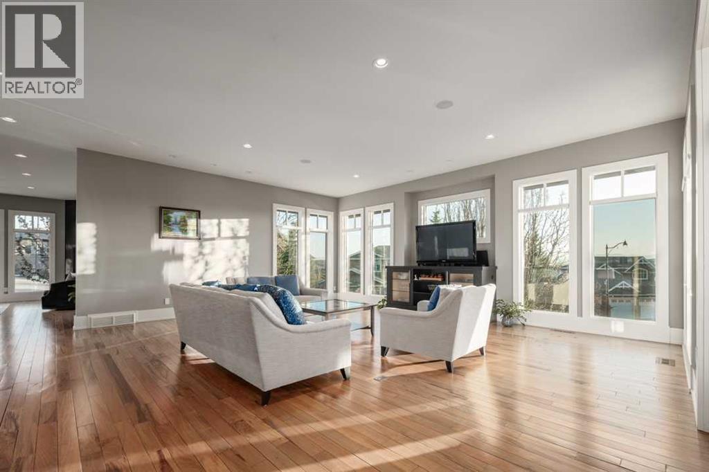 16 Spring Valley Way Sw, Calgary, AB - Indoor Photo Showing Living Room