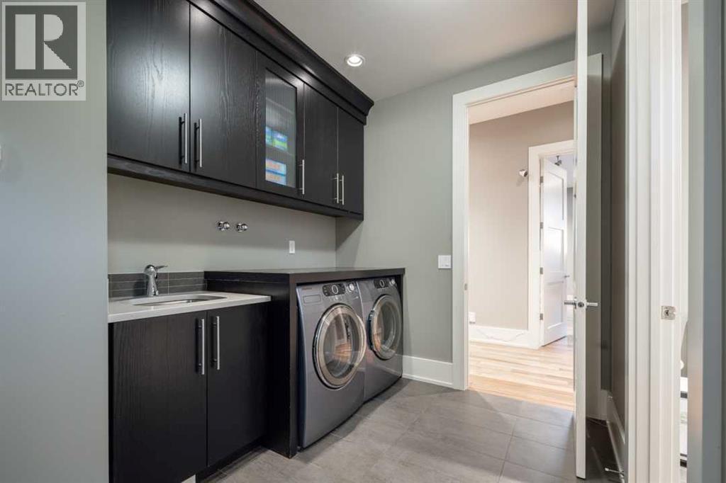 16 Spring Valley Way Sw, Calgary, AB - Indoor Photo Showing Laundry Room