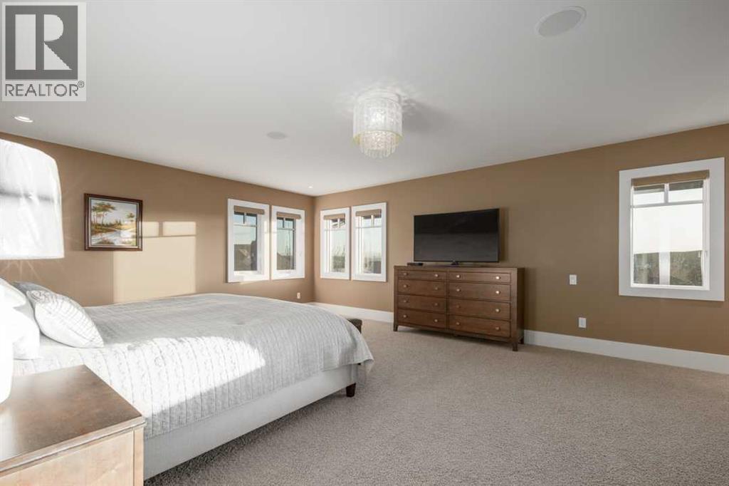 16 Spring Valley Way Sw, Calgary, AB - Indoor Photo Showing Bedroom