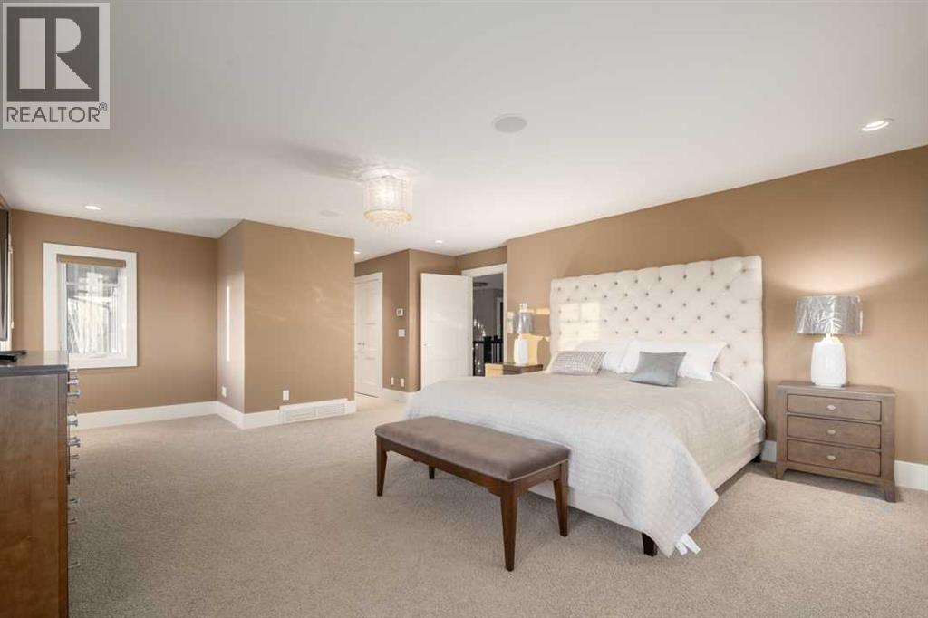 16 Spring Valley Way Sw, Calgary, AB - Indoor Photo Showing Bedroom