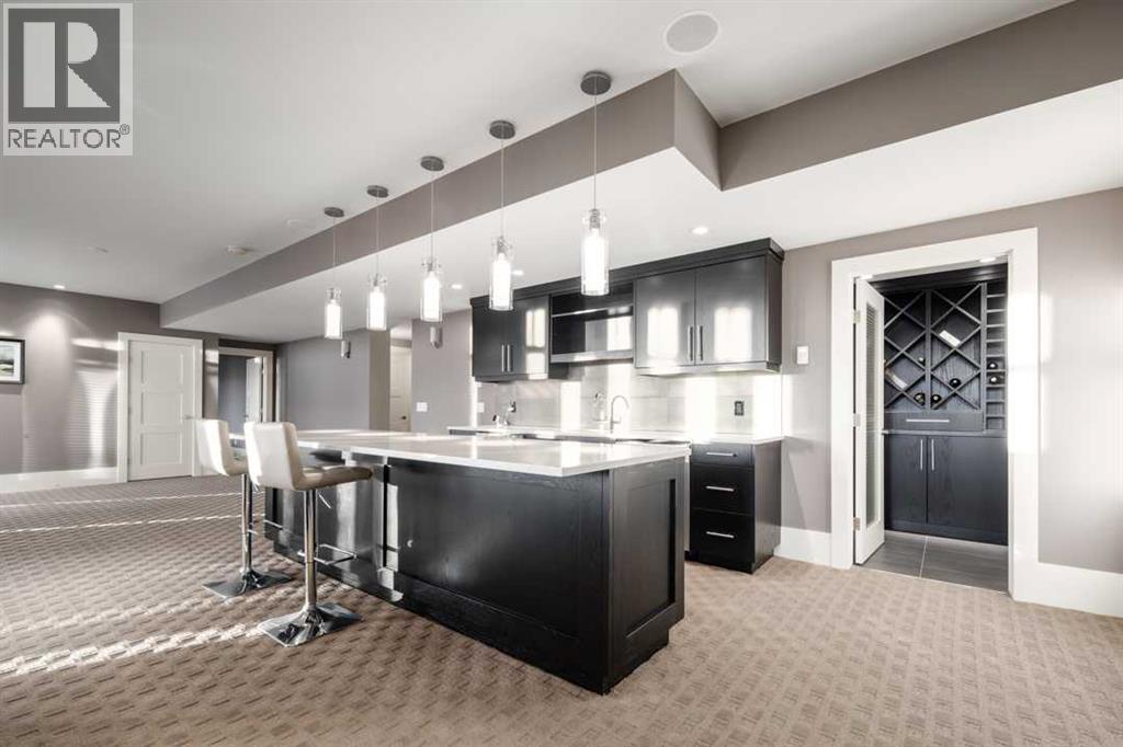 16 Spring Valley Way Sw, Calgary, AB - Indoor Photo Showing Kitchen With Upgraded Kitchen