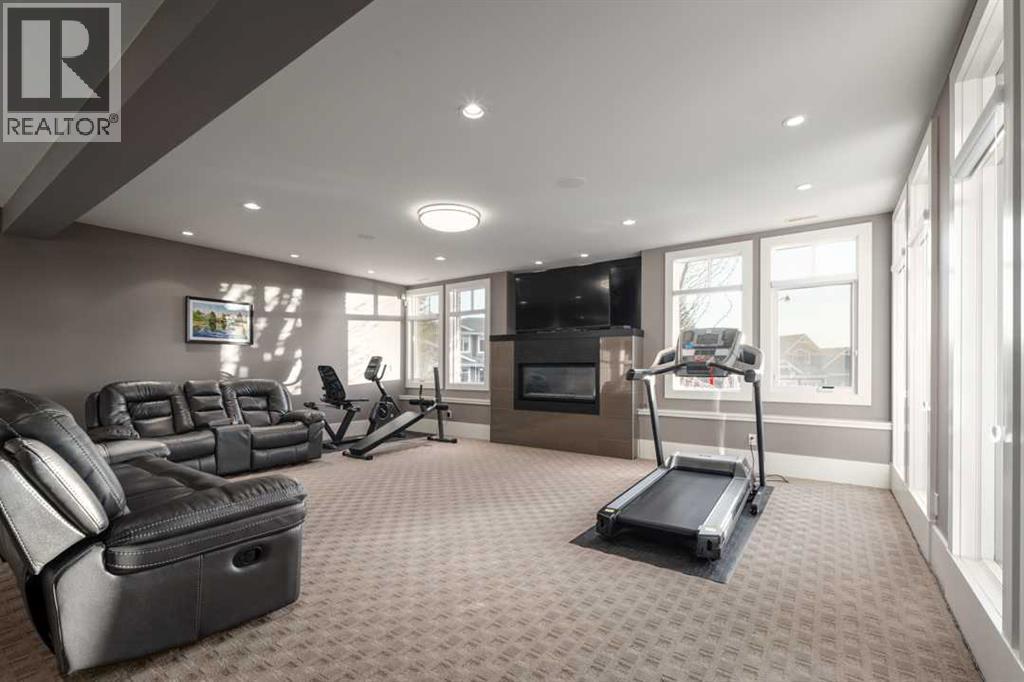 16 Spring Valley Way Sw, Calgary, AB - Indoor With Fireplace