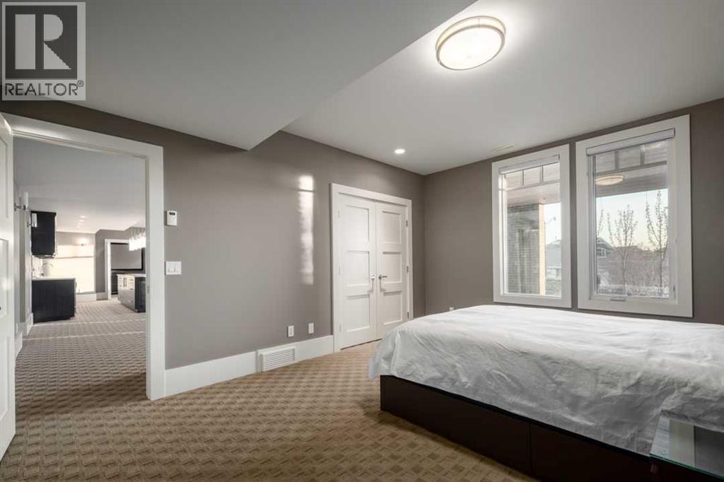 16 Spring Valley Way Sw, Calgary, AB - Indoor Photo Showing Bedroom