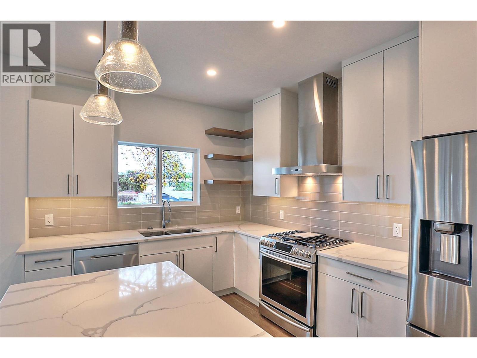 *SIMILAR TO IMAGE* - 4499 Walker Road, Kelowna, BC - Indoor Photo Showing Kitchen With Stainless Steel Kitchen With Double Sink With Upgraded Kitchen