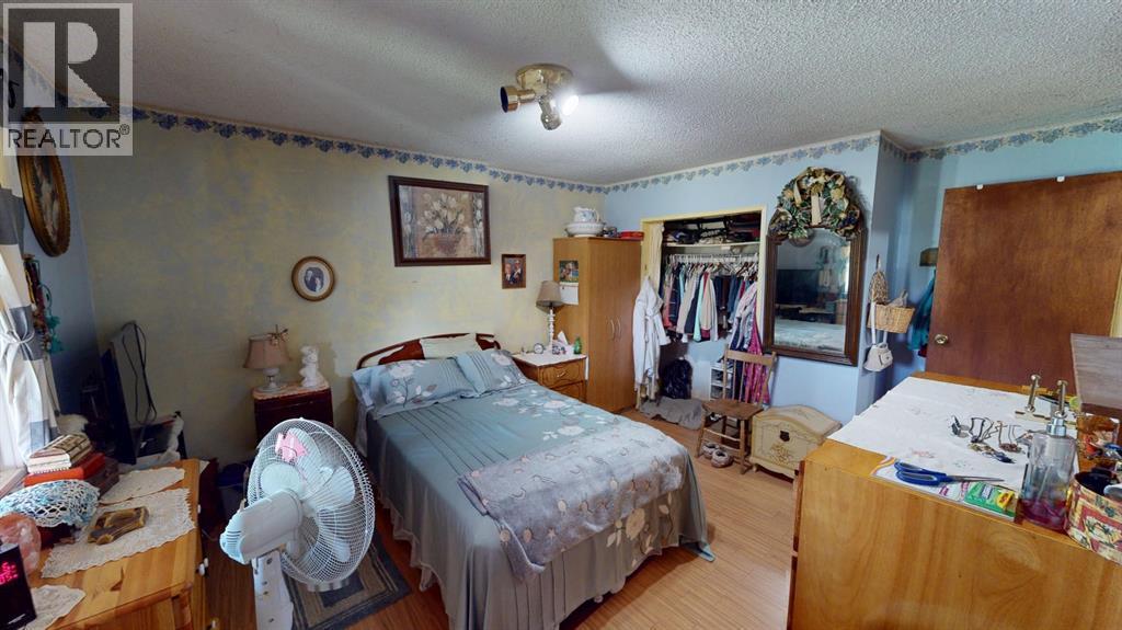 219 181043 Hwy 550 Drive, Rural Newell, County Of, AB - Indoor Photo Showing Bedroom
