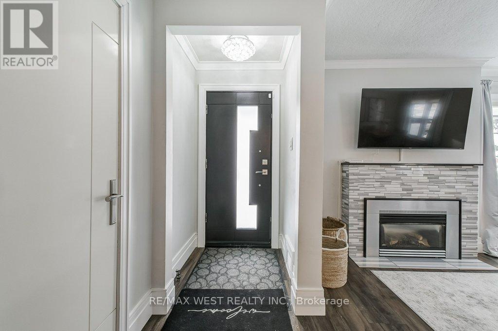195 Berry Road, Toronto, ON - Indoor Photo Showing Living Room With Fireplace