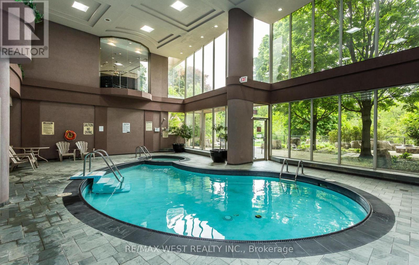 1510 - 50 Eglinton Avenue W, Mississauga, ON - Indoor Photo Showing Other Room With In Ground Pool