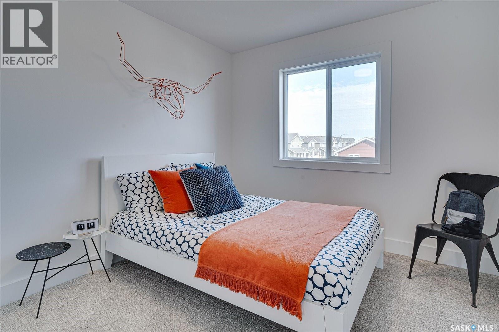 79 Rosewood Boulevard E, Saskatoon, SK - Indoor Photo Showing Bedroom