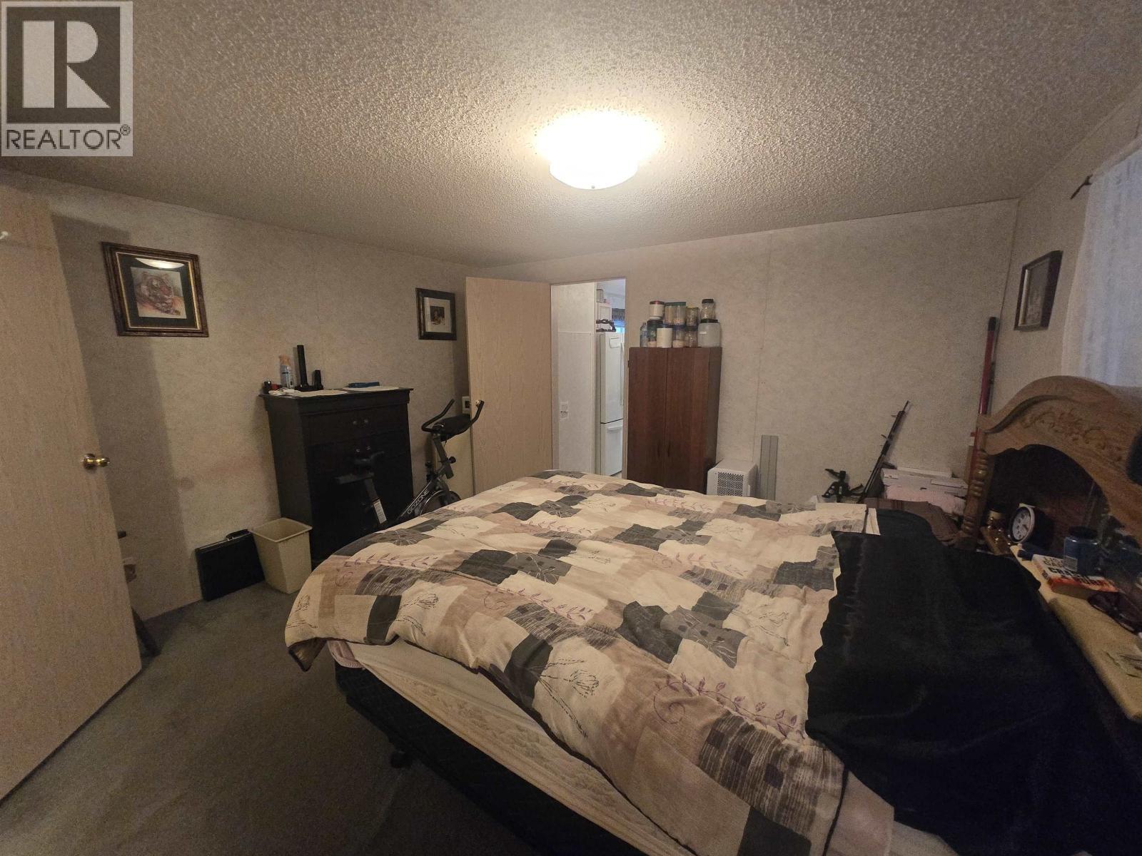 1483 Cody Dale Road, Quesnel, BC - Indoor Photo Showing Bedroom