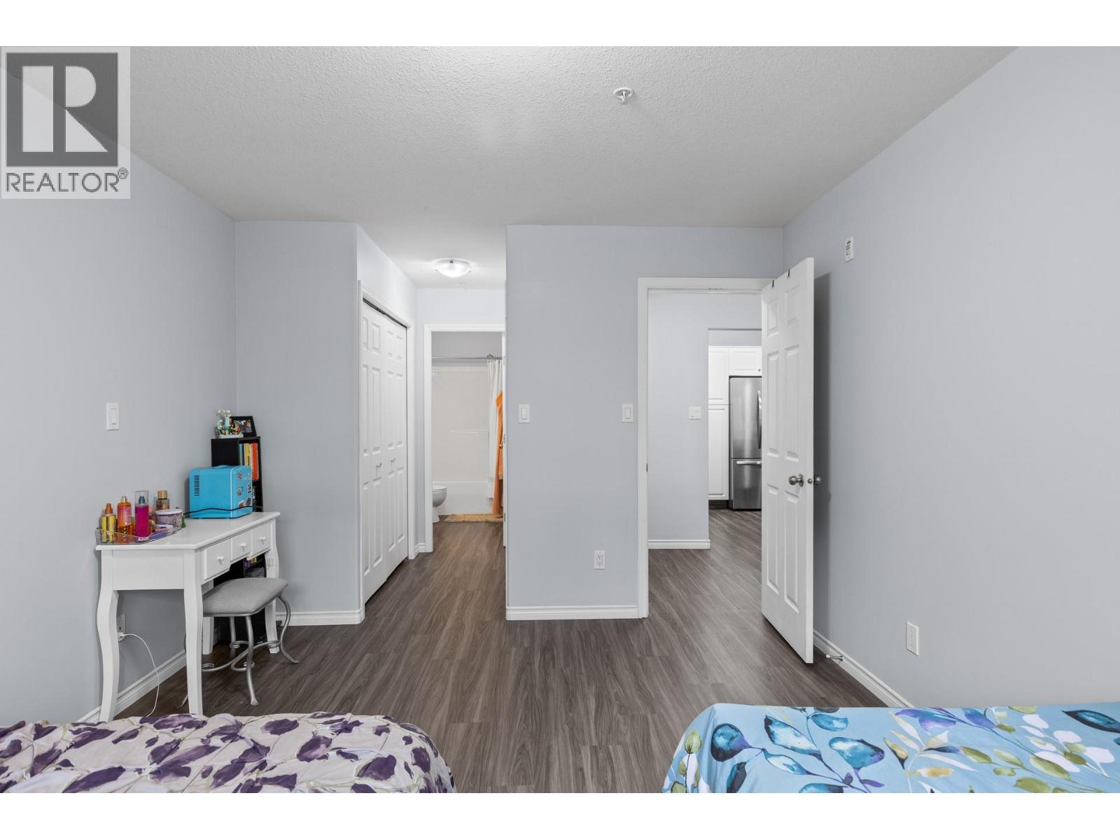 Large Primary Suite with lots of storage and separate ensuite - 1966 Durnin Road Unit# 105, Kelowna, BC - Indoor Photo Showing Bedroom