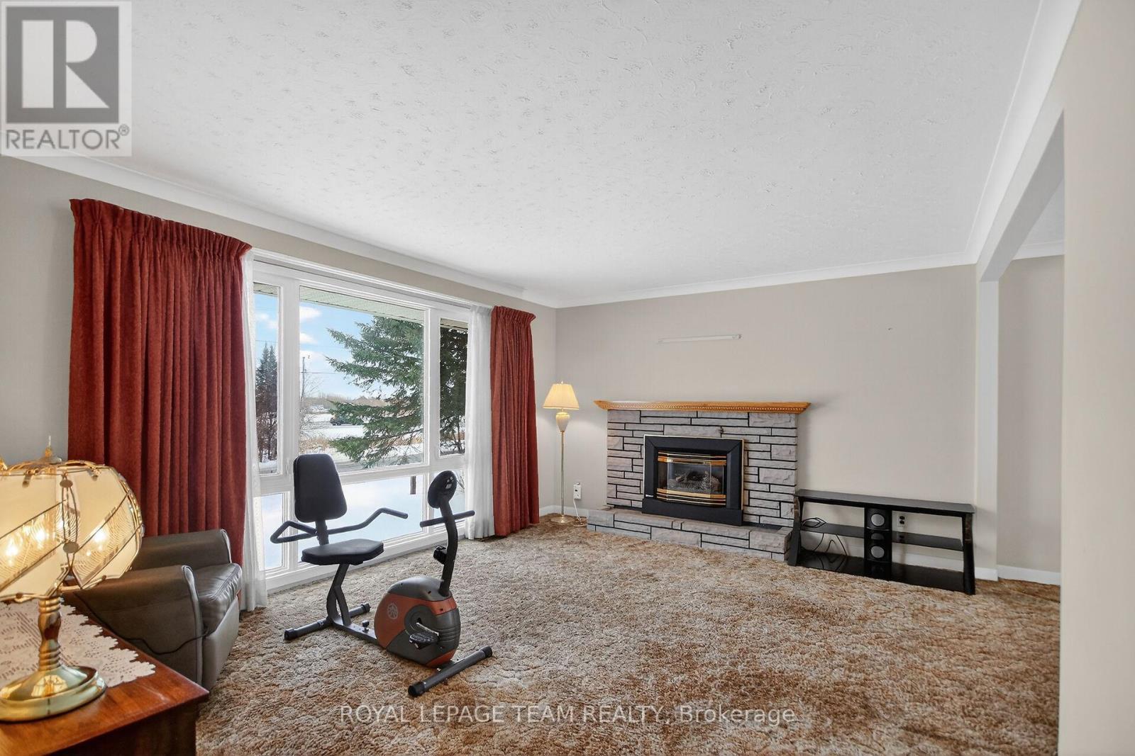 1494 Meadow Drive, Ottawa, ON - Indoor Photo Showing Living Room With Fireplace