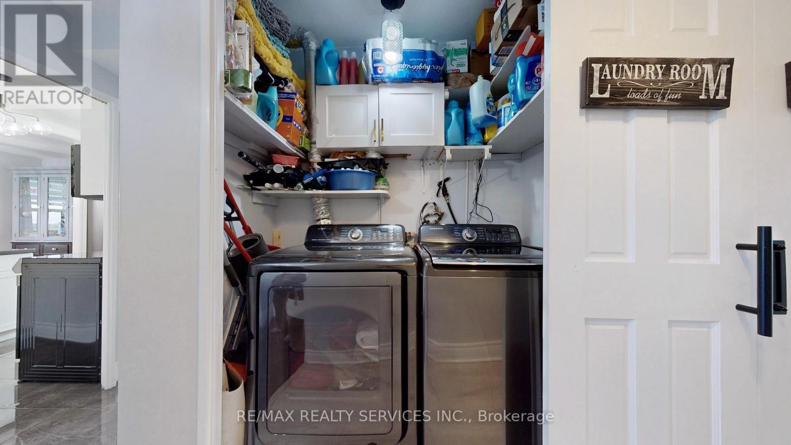 1219 - 551 The West Mall, Toronto, ON - Indoor Photo Showing Laundry Room