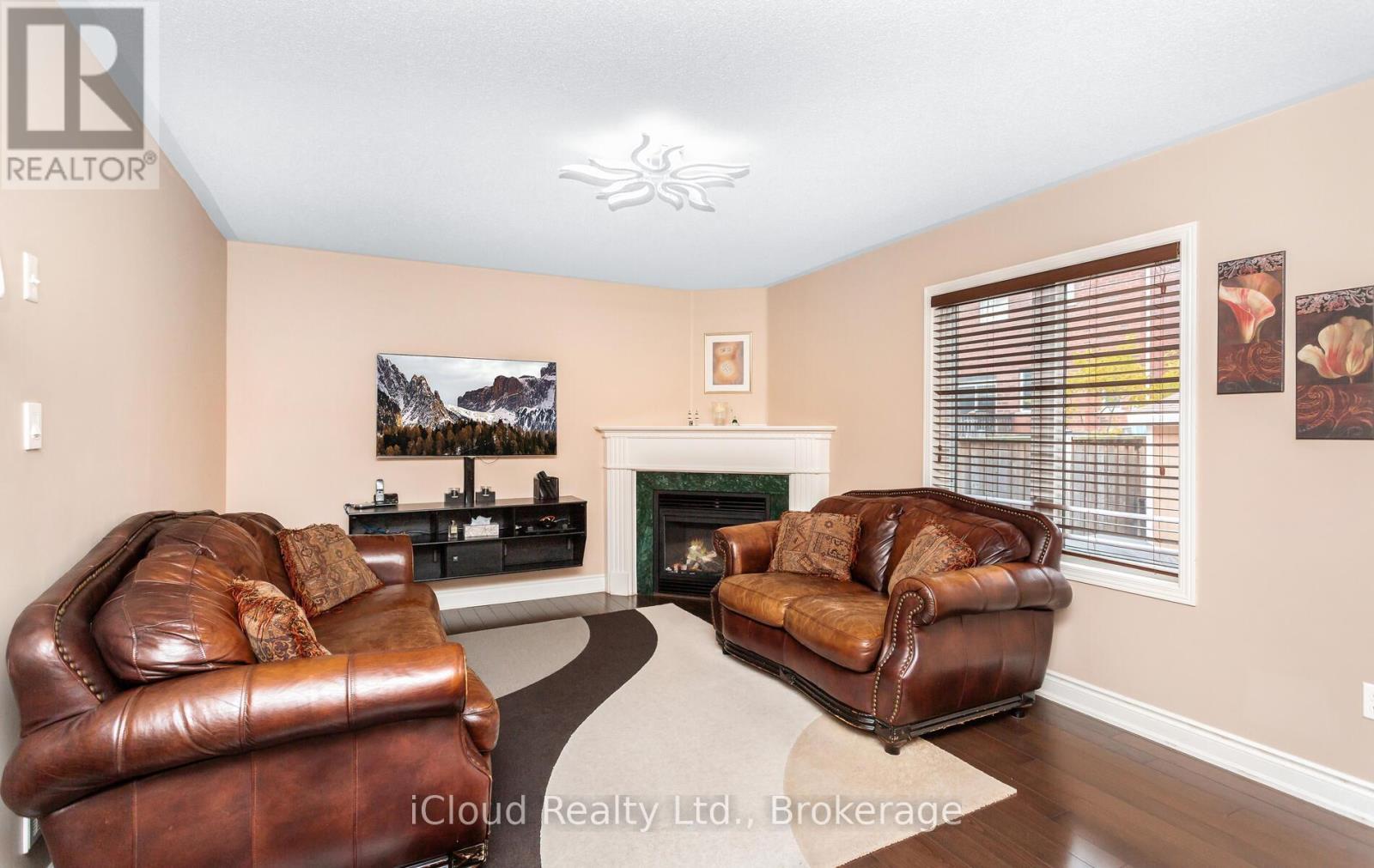 491 Landsborough Avenue, Milton, ON - Indoor Photo Showing Living Room With Fireplace