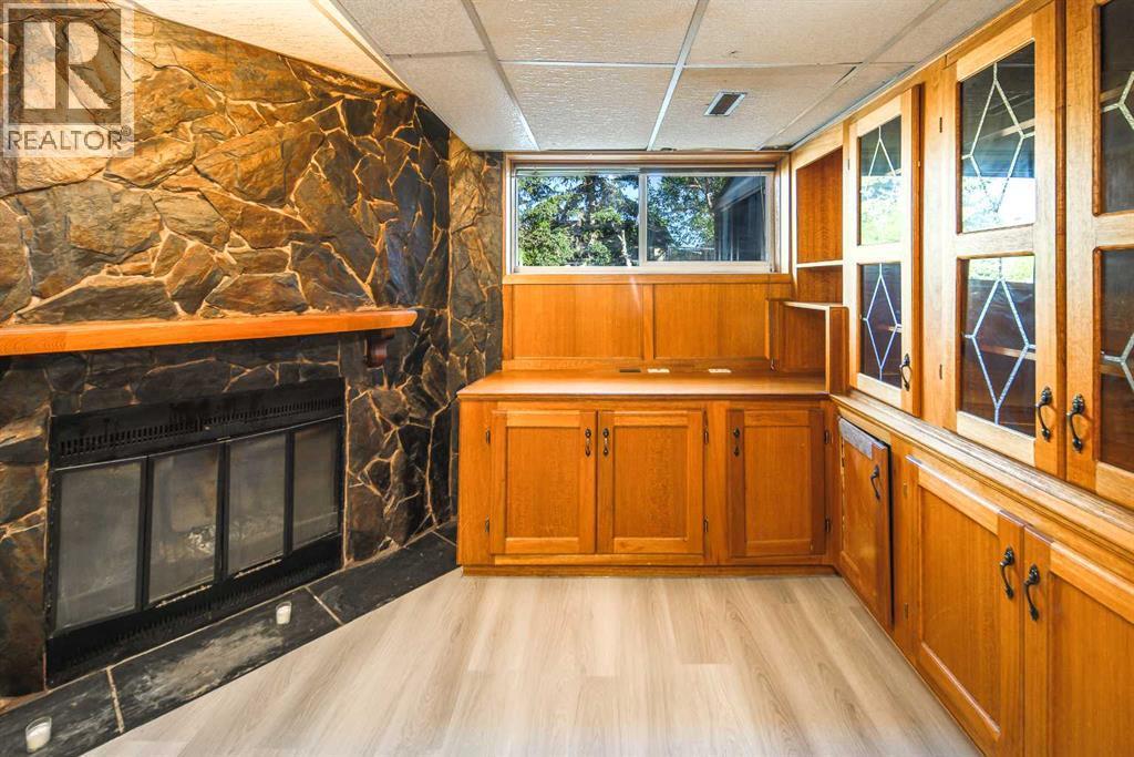 20 Bernard Way Nw, Calgary, AB - Indoor With Fireplace